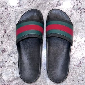 Authentic Gucci black pool slides. Mens size 10